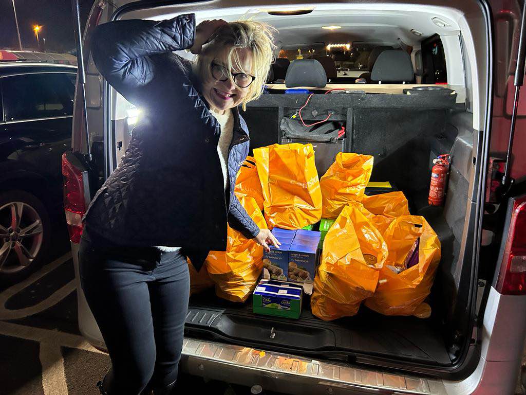 Gilly Bachelor Travel Expert Food Bank Donation