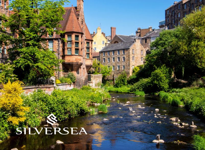 Canal lined with houses in Edinburgh, Scotland.